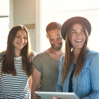 Three friends smiling